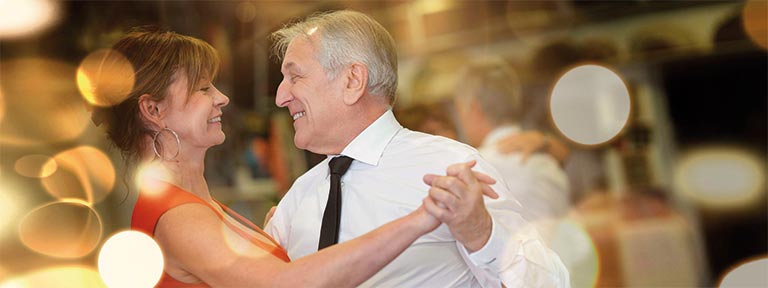 A couple dancing in a ballroom